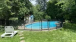 safety pool fence around a swimming pool
